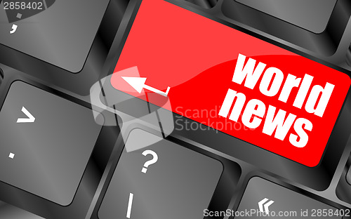 Image of words world news on computer keyboard key