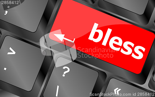 Image of bless text on computer keyboard key - business concept