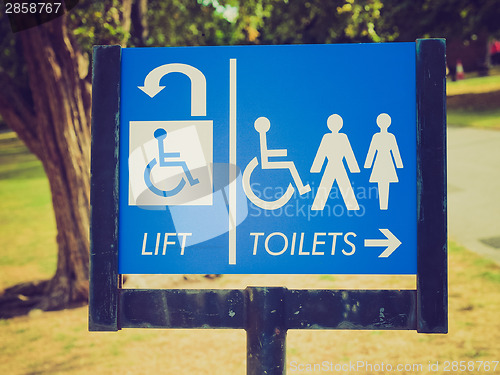 Image of Retro look Lift and toilets sign