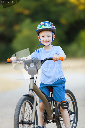 Image of kid riding bicycle