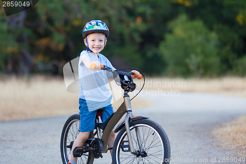 Image of kid riding bicycle