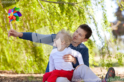 Image of family with pinwheel