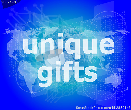 Image of unique gifts text on digital touch screen - holiday concept