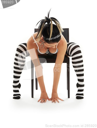 Image of striped underwear girl in chair