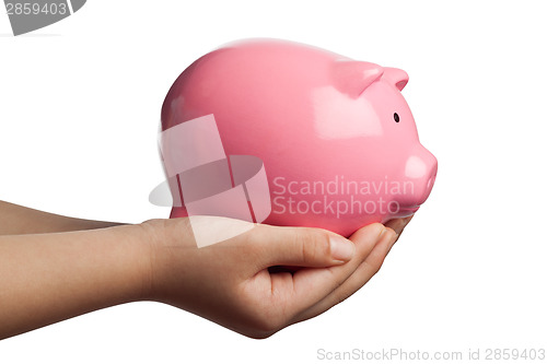 Image of Child holding a piggy bank