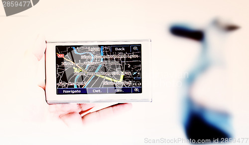 Image of Gps in a man hand.