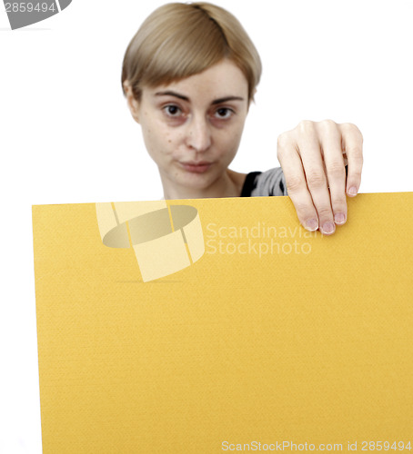 Image of Woman holding a paper