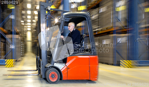 Image of forklift in warehouse