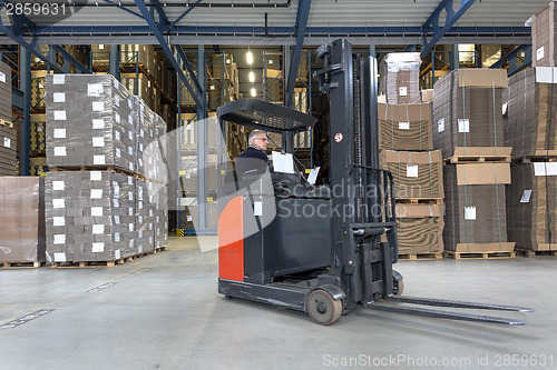 Image of Reach Truck in warehouse