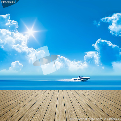 Image of wooden jetty speed boat
