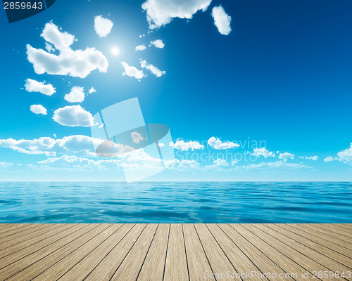 Image of wooden jetty bright sky