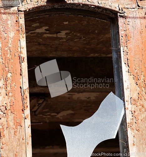 Image of Wall of old destroyed house with broken windows