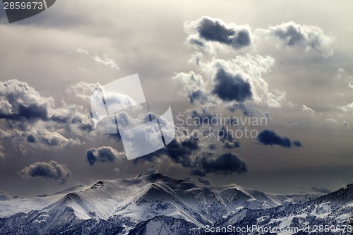 Image of Evening mountains and cloudy sky