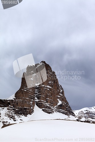 Image of Snow rocks and grey sky