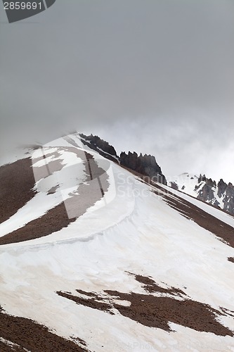 Image of Snowy mountains before rain