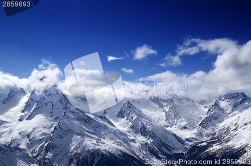 Image of Snowy mountains at sun day