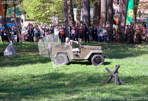 Image of Driving military car