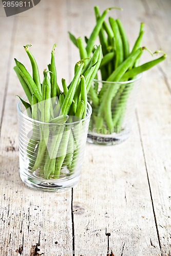 Image of green string beans in glasses 