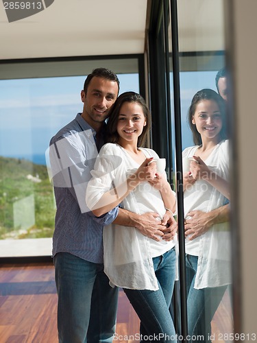 Image of relaxed young couple at home