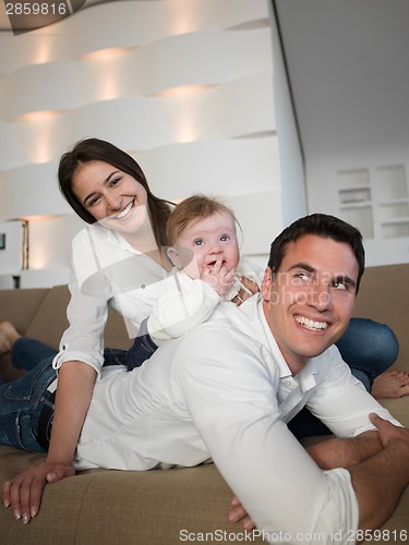 Image of happy young family at home