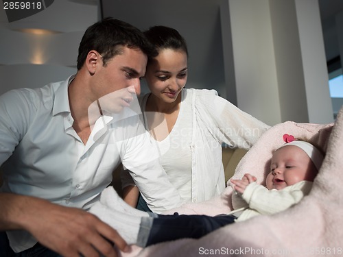 Image of happy young family at home