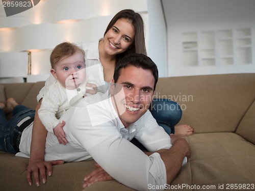 Image of happy young family at home