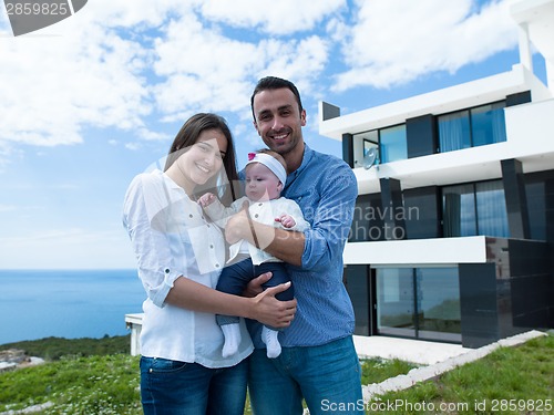 Image of happy young family at home