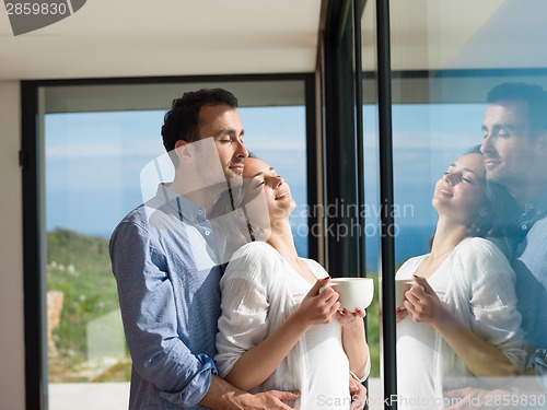 Image of relaxed young couple at home