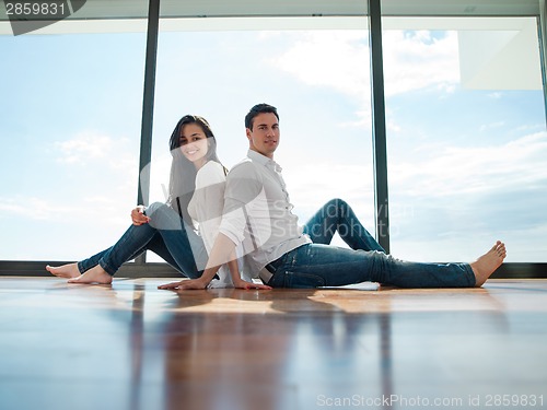 Image of relaxed young couple at home