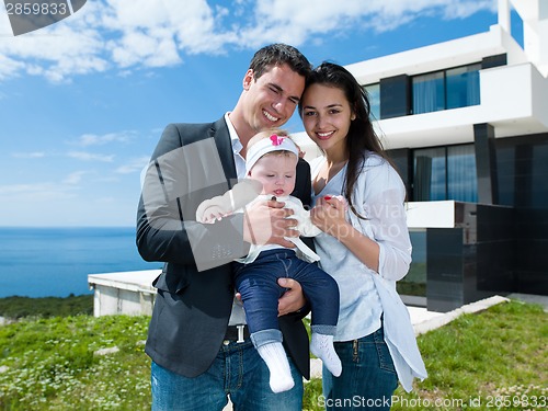 Image of happy young family at home