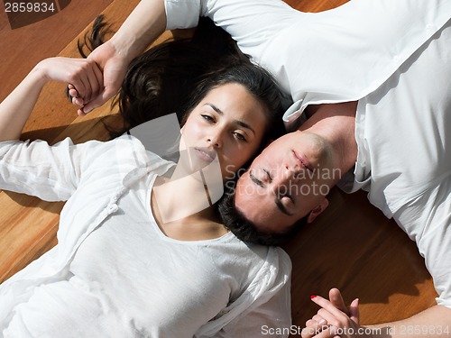 Image of relaxed young couple at home