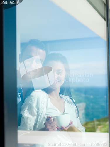 Image of relaxed young couple at home