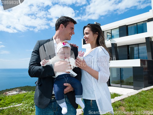 Image of happy young family at home