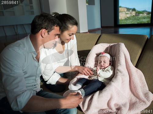 Image of happy young family at home