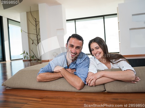Image of relaxed young couple at home