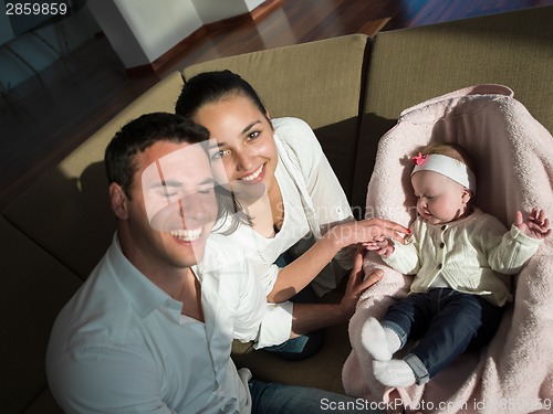 Image of happy young family at home