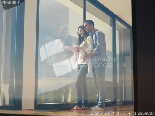 Image of relaxed young couple at home