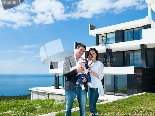 Image of happy young family at home