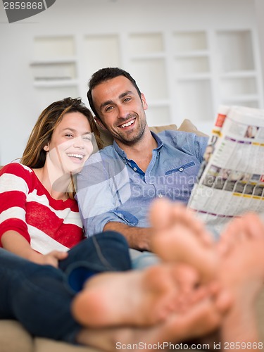 Image of relaxed young couple at home