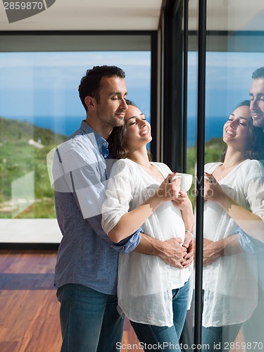 Image of relaxed young couple at home