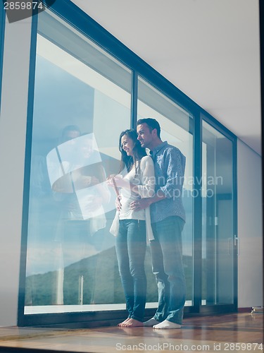 Image of relaxed young couple at home