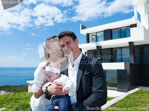 Image of happy young family at home