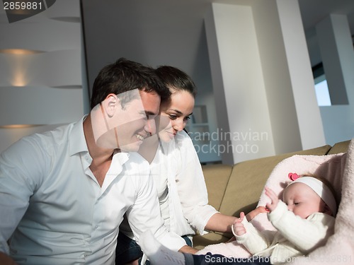 Image of happy young family at home