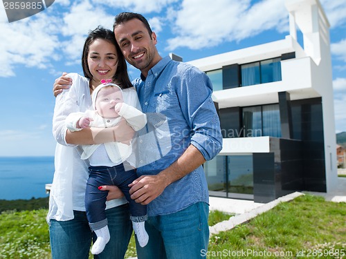 Image of happy young family at home