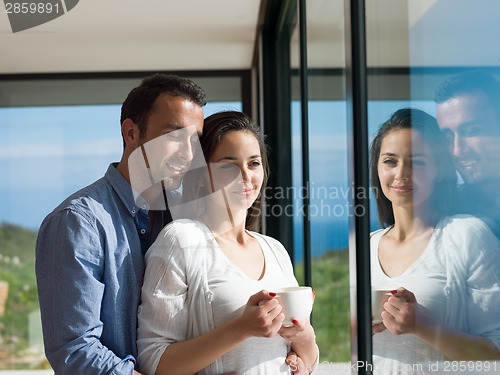 Image of relaxed young couple at home