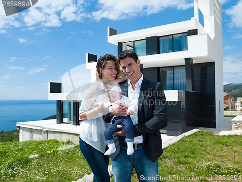 Image of happy young family at home