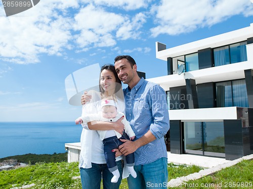Image of happy young family at home