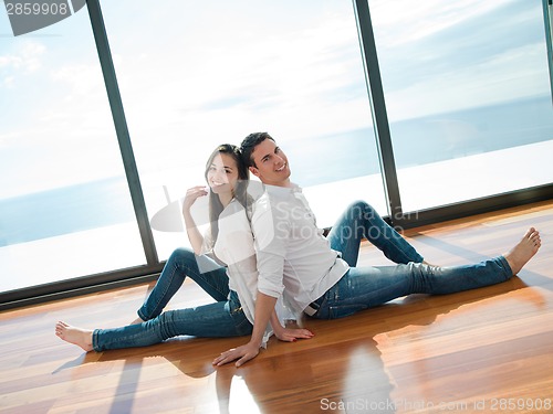 Image of relaxed young couple at home