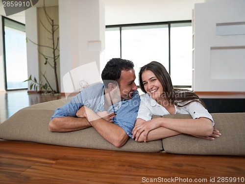 Image of relaxed young couple at home