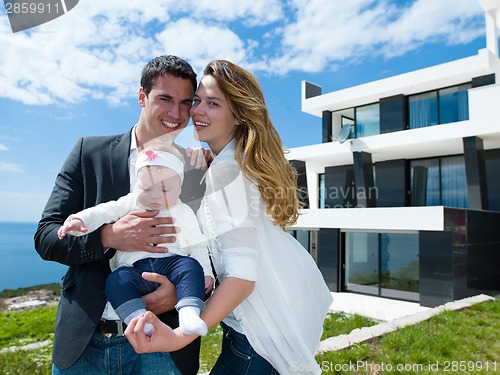 Image of happy young family at home